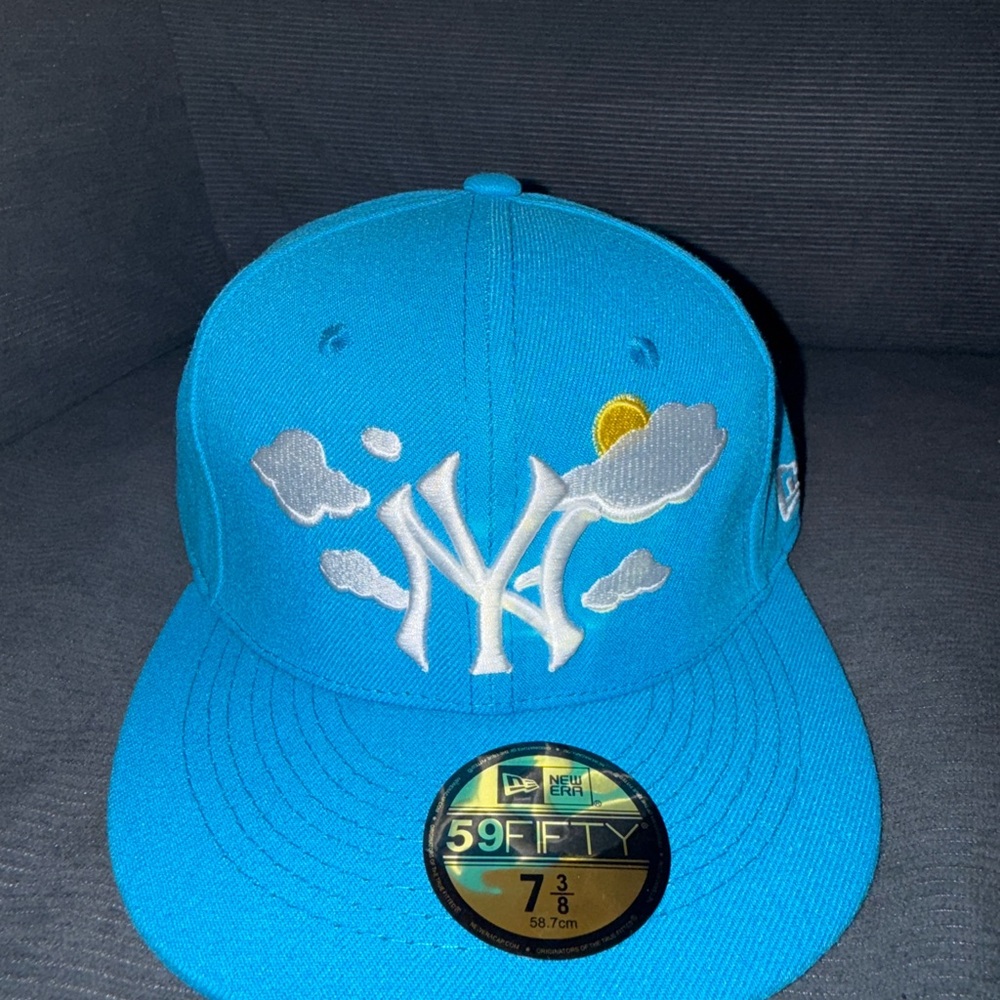 New Era Sky Blue Cap with Cloud and Sun Design size 7 3/8